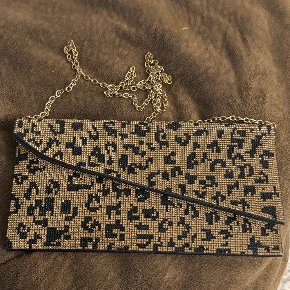 Elegant Gold and Black Clutch